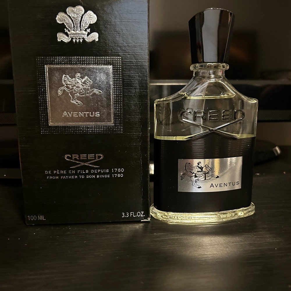 Creed Aventus Fragrance with Black and Silver Accents